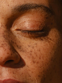 Close-up of a person's eye with a blurred background